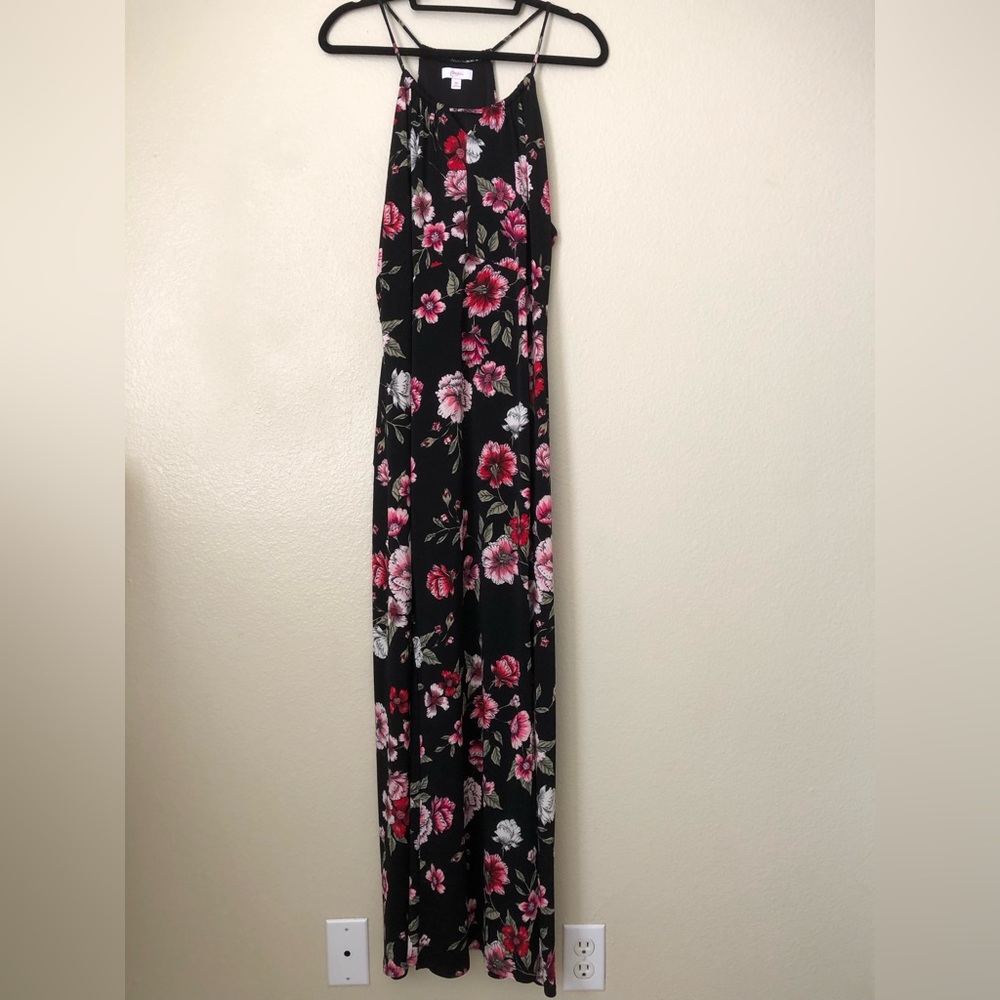 black red, pink, and white floral maxi dress, no sleeve, 2 knee length slit